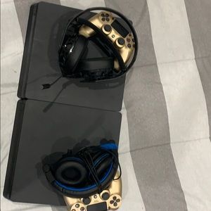 Two PS4’s with headsetWith gold controller